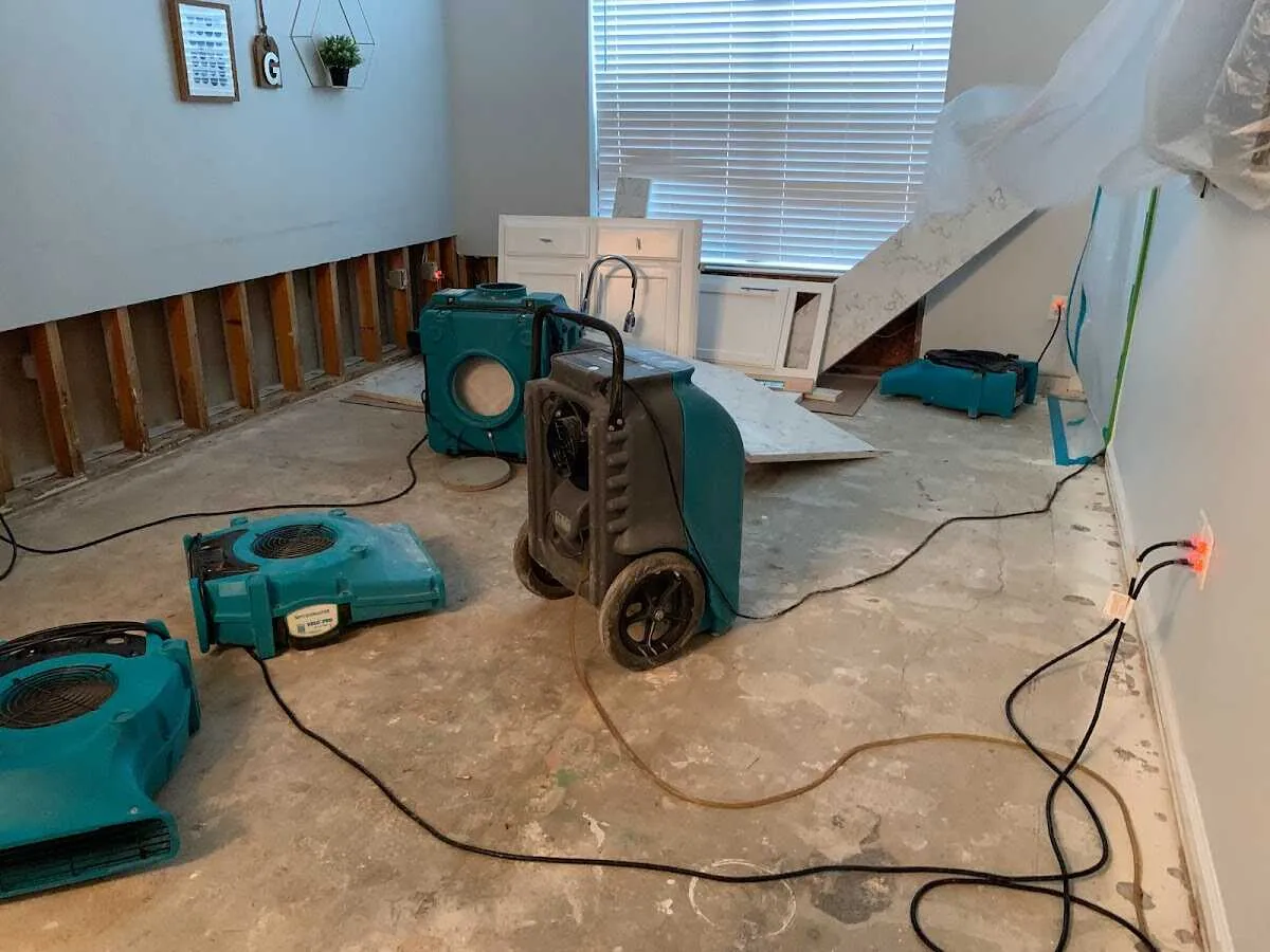 Dehumidifier in flood-cut room for Water Damage Restoration in Walpole